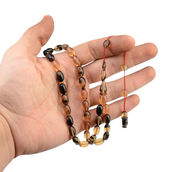 Özel Seri İmzalı Sistem Püsküllü 11x7 mm Kapsül Kesim Ateş Kehribar Tesbih ürün görseli 1
