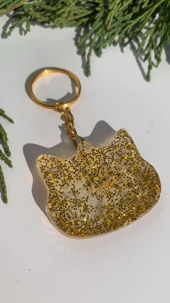 Şeffaf Epoksi İçinde Gold Yıldız Pullu Simli Gold Aksesuarlı Kedi Köpek Başı Anahtarlık El Yapımı Hediyelik ürün görseli 1