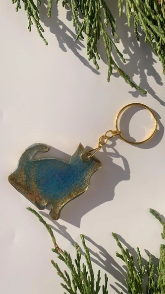 Okyanus Mavisi Gold Ebruli Renk Gold Aksesuarlı Yaramaz Kedi Epoksi Anahtarlık El Yapımı Hediyelik ürün görseli 1