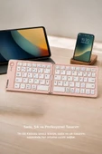 Kablosuz Klavye Bluetooth Katlanabilir Şarjlı Mini Klavye TK08 Pembe thumbnail 3