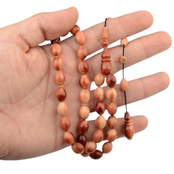 Özel Seri İmzalı Sistem Püsküllü 11x8.5 mm Arpa Kesim Sıkma Kehribar Tesbih ürün görseli 1