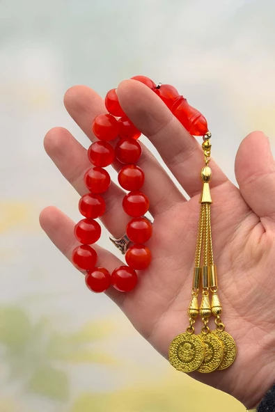 Küre Kararmaz Gold Püsküllü 17'lik Sıkma Kehribar Tesbih ürün görseli 1