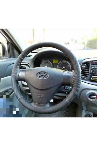 DİKİŞLİ DERİ DİREKSİYON KILIFI KARBON NUBUK SİYAH DİKİŞLİ HYUNDAİ ERA ürün görseli 1