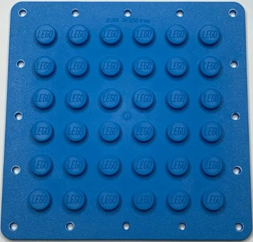 Lego 6395359 Plate, Modified 6 x 6 Flexible Rubber with Stitching Holes Dark Azure ürün görseli 1