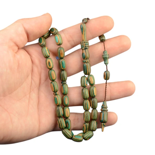 Kapsül Kesim 11x7 mm Kafur Ağacı Sistem Püsküllü Tesbih ürün görseli 1