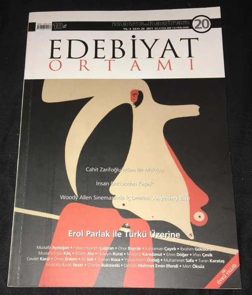 EDEBİYAT ORTAMI Mayıs Haziran 2011 Sayı 20 EROL PARLAK İLE TÜRKÜ ÜZERİNE (Sahafiye Kitap) ürün görseli 1