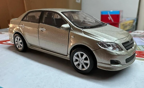 Oyuncak Metal Model Araba 1/36 Çek Bırak 2009 Toyota Corolla Açık Kahve ürün görseli 1