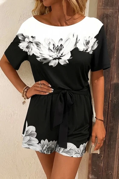 Kadın Tek Omuzu Açık çiçek Desenli Beli Kuşaklı Iki Iplik Mini Short Tulum ürün görseli 1