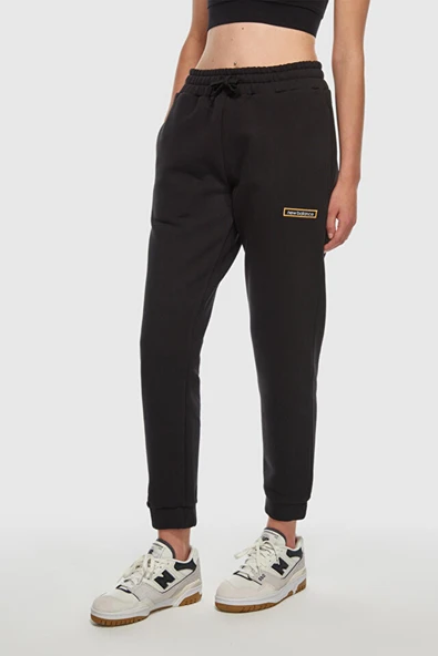 New Balance Lifestyle WNP3506-BK Siyah Kadın Eşofman Altı ürün görseli 1