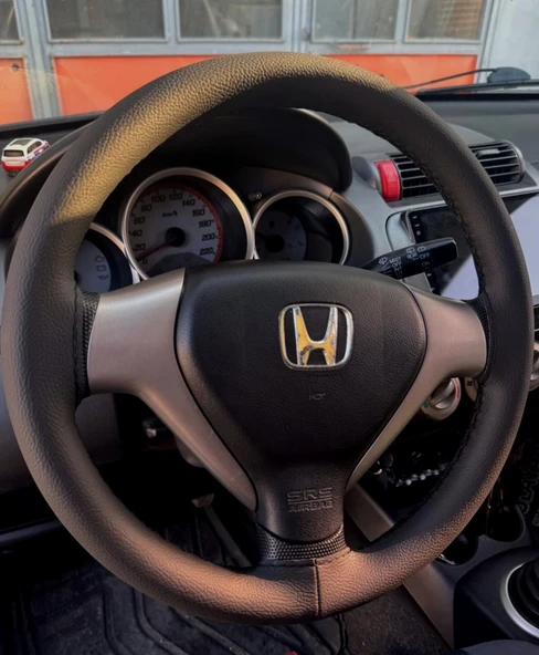 DİKİŞLİ DİREKSİYON KILIFI SİYAH DERİ SİYAH DİKİŞLİ HONDA JAZZ - CİTY İÇİN ürün görseli 1