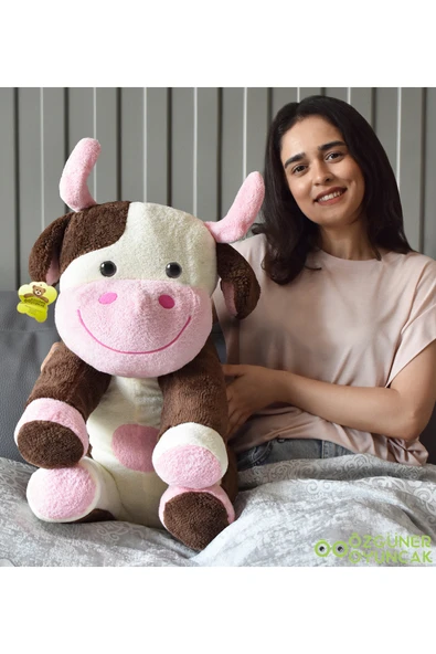 Özgüner Oyuncak Sevimli Oturan İnek Peluş Oyuncak – Rahatlatıcı ve Şirin Arkadaş ürün görseli 1