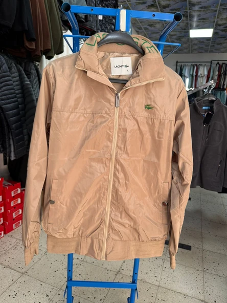 LACOSTE BEJ RENGİ İNCE MEVSİMLİK MONT ürün görseli 1