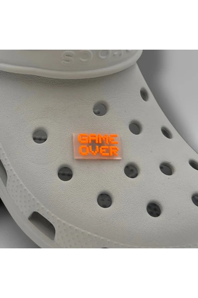 Crocs Terlik Süsü ve Aksesuarı , Çanta Süsü – Jibbitz 3D Game Over Yazısı Şeffaf Zemin Logo Aksesuar ürün görseli 1