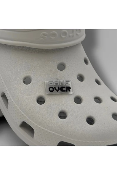 Crocs Terlik Süsü ve Aksesuarı , Çanta Süsü – Jibbitz 3D Game Over Yazısı Şeffaf Zemin Logo Aksesuar ürün görseli 1