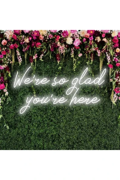 We're so glad you're here Yazılı Neon Tabela ürün görseli 1