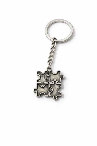Puzzle Parça Motifli Gümüş Renk Metal Unisex Anahtarlık – Sembolik Tasarım ürün görseli 1