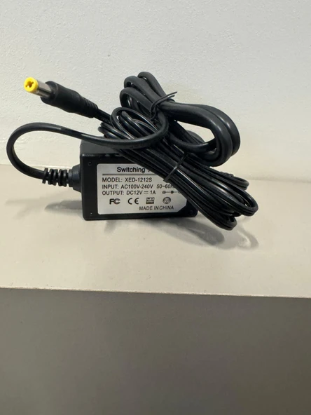 Switching Adaptor XED-1212, AC100V-240V-50-60 HZ-DC12V ürün görseli 1