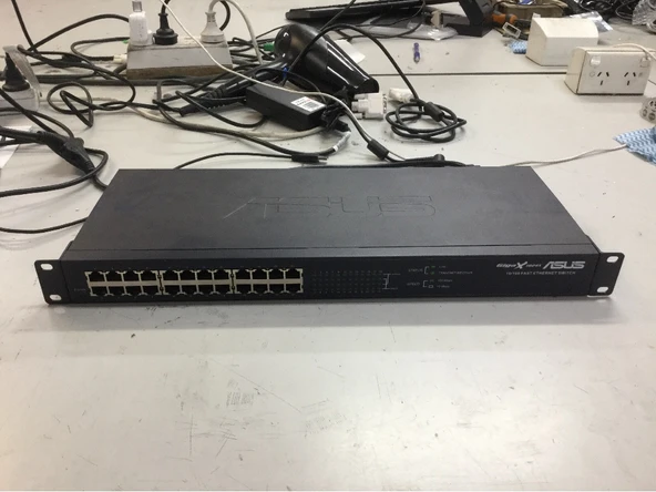 ASUS GigaX 1024x 24 Ports 10/100 Fast Ethernet Switch Unit Powers On Sold As Is 94801+10 2. EL YENİLENMİŞ ÜRÜN ürün görseli 1