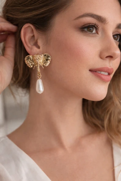 Lovecharm Gold Renk Fil Figürlü İnci Detaylı Kadın Küpe ürün görseli 1