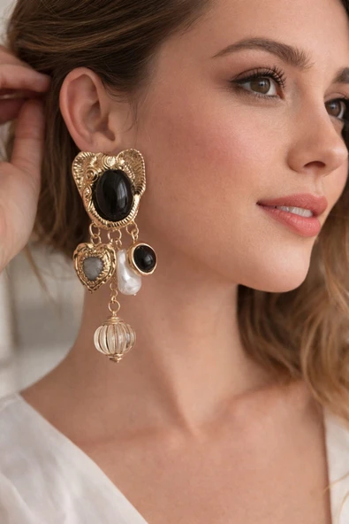 Lovecharm Fil Figürlü Siyah Taş Detaylı Gold Renk Sallantılı Kadın Küpe ürün görseli 1