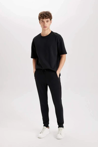 A4387 Jogger Slim Fit Dar Kesim Beli Bağcıklı Lastikli Paça Fermuar Cepli Eşofman Altı ürün görseli 1