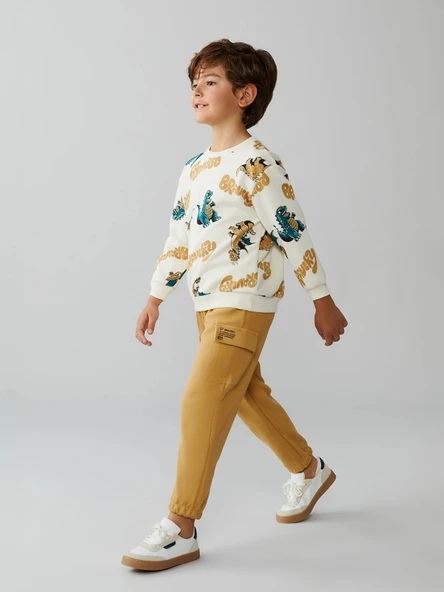 LCW Kids Bej Beli Lastikli Baskılı Erkek Çocuk Eşofman Alt ürün görseli 1