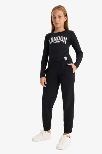 Defacto Y1226A6BK81 Siyah Kız Çocuk Standart Fit Basic Düz Beli Lastikli Okul Jogger Eşofman Altı ürün görseli 1