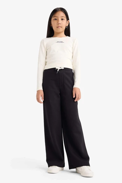 Defacto D0743A8BK81 Siyah Kız Çocuk Wide Leg Beli Lastikli Geniş Paça Eşofman Altı ürün görseli 1