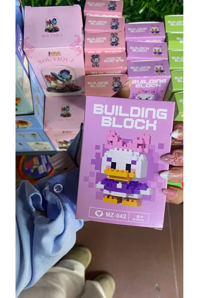 Mevsimsiz Çiçek Daiys duck kadın figür lego yapımı ürün görseli 1
