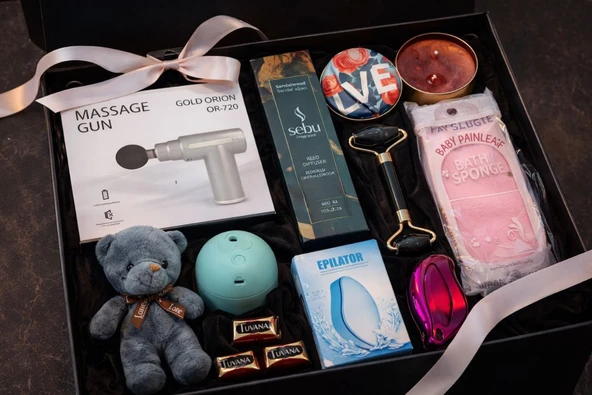 Kadınlara Özel 9 Parça Lüks Bakım Seti - Şarjlı Masaj Tabancası, Buhar Makinesi & Anneye Hediye Seti ürün görseli 1