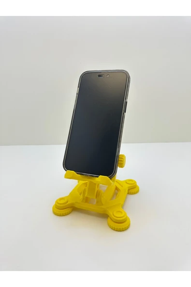 Butik 3D Baskı Mekanik Görünümlü Sarı Renk Telefon ve Tablet Tutucu ürün görseli 1