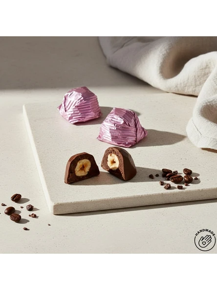 Nutat Pembe Sargılı Kristal Çikolata  Fındık Kremalı & Bütün Fındıklı 500 GR. ürün görseli 1