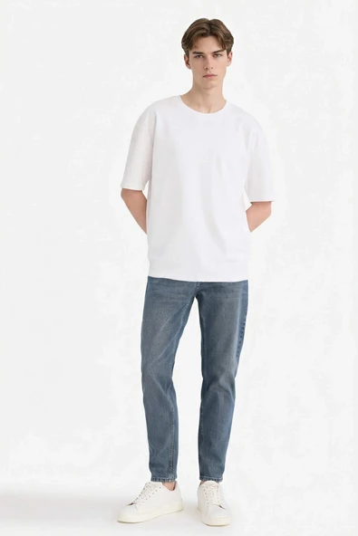 Defacto G1300AXNM84 İndigo Slim Tapered Fit Jean Pantolon ürün görseli 1