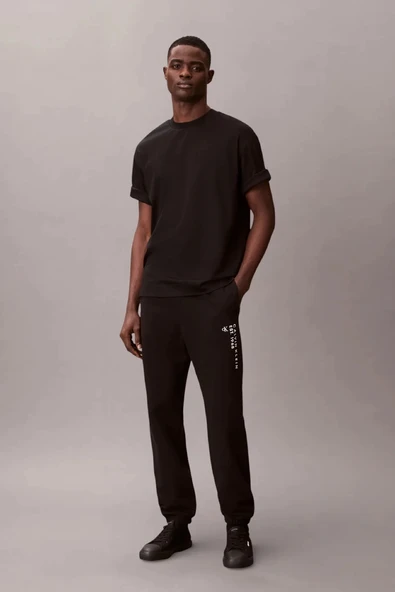 Calvin Klein Havlu Kumaş Calvin 1968 Grafikli Erkek Siyah Eşofman Altı LV14RF248G-UB1 ürün görseli 1
