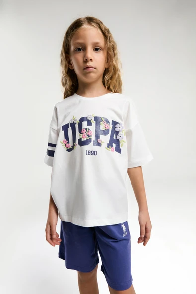 U.S. Polo Assn. Garson Kız Çocuk Rahat Kalıp Oversize Pamuklu Yazılı Kısa Kollu Şortlu Pijama Takım ürün görseli 1