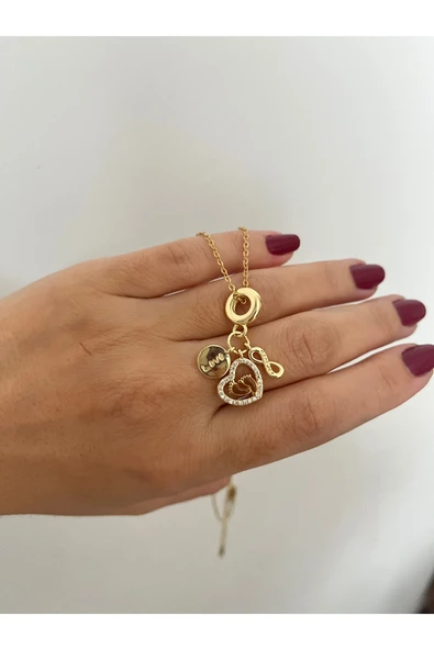nergis collection Kadın Anne Bebek Kolyesi Tasarım Bebek Ayaklı Zirkon Taşlı Charmlı Kolye ürün görseli 1