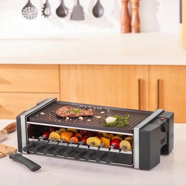 Karaca Raclette Izgara 1200 Watt, Yanmaz, Yapışmaz Kaplamalı Döküm Izgara Plakaları, 9 Şiş Hazırlama İmkanı, Geniş Izgara Yüzeyi, Ayarlanabilir Sıcaklık, Kapatma Düğmesi, Party Grill ürün görseli 1