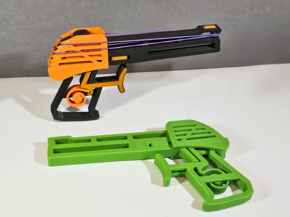3D Yazıcı Baskı Lastik Atan Oyuncak Tabanca - Mekanizmalı Eğlence Oyuncağı ürün görseli 1