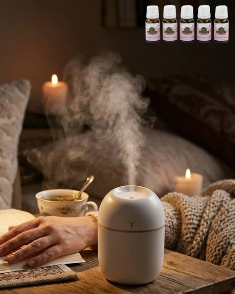 Mini Nemlendirici 5 Esans Hediyeli Led Işıklı Taşınabilir Aromaterapi Buhar Makinesi ürün görseli 1
