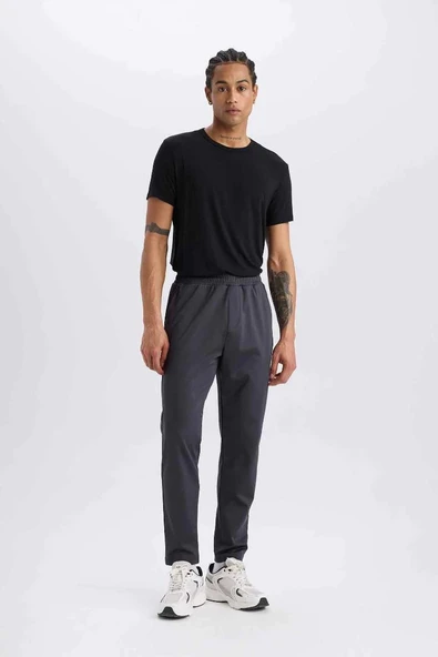 E3930 DeFactoFit Sporcu Jogger Slim Fit Dar Kesim Standart Paça Skuba Dalgıç Kumaş Beli Lastikli Düz Paça Eşofman Altı ürün görseli 1