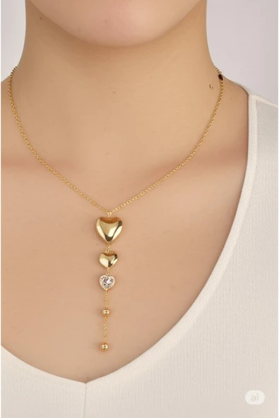 FAMEMUS ACCESSORY Çelik Gold Renk Sallantı Kalp Model Zirkon Taş Detaylı Kadın Kolye ürün görseli 1