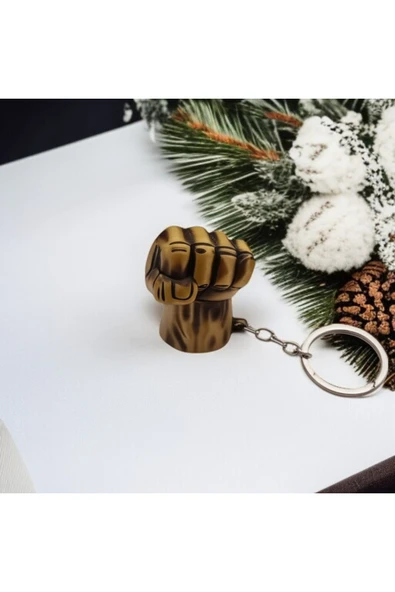 FAMEMUS ACCESSORY Metal Yumruk Tasarımlı Anahtarlık – Altın Renk.. ürün görseli 1
