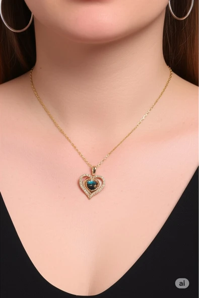 FAMEMUS ACCESSORY Çelik Gold Renk Zirkon Taşlı Kalp Galaksi Model Kadın Kolye ürün görseli 1