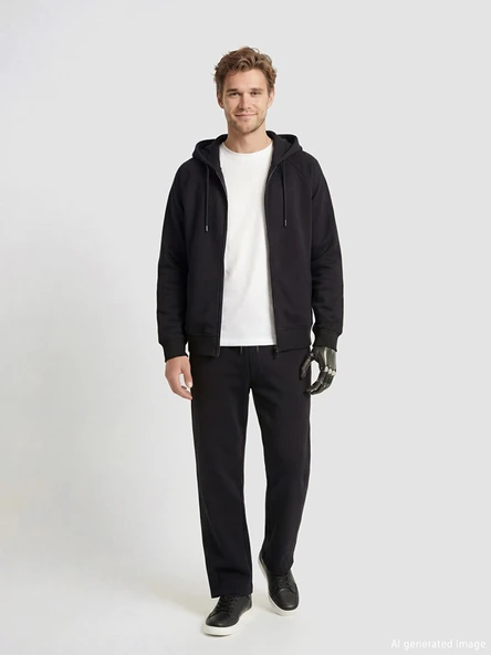 LCW Limitless Siyah Kolay Giyilebilir Paçaları Çıtçıtlı Erkek Loose Fit Eşofman Altı ürün görseli 1
