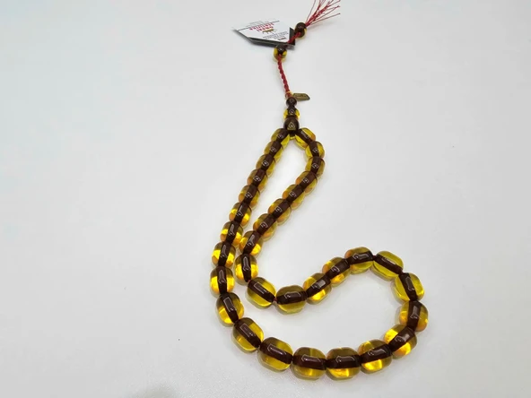 Omari İmzalı Sertifikalı Alman Faturan Sıkma Kehribar Tesbih 9x11 mm Fıçı Kesim ürün görseli 1
