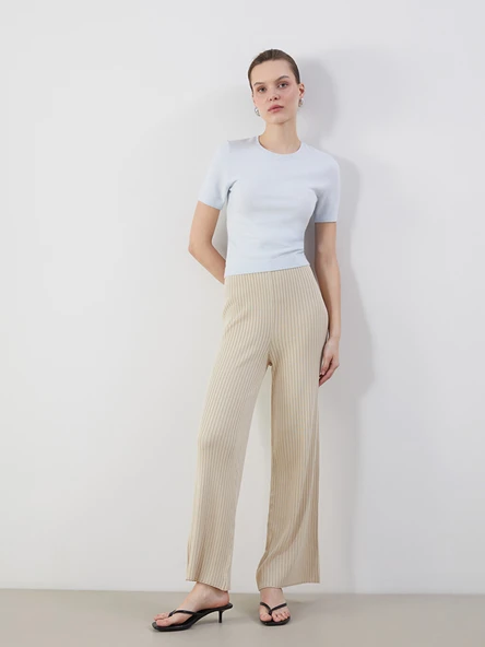 LCWAIKIKI Classic Bej Beli Lastikli Dokulu Kadın Triko Pantolon ürün görseli 1