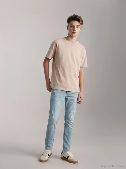 LCW Kids İndigo Yırtık Detaylı Süper Skinny Fit Erkek Çocuk Jean ürün görseli 1