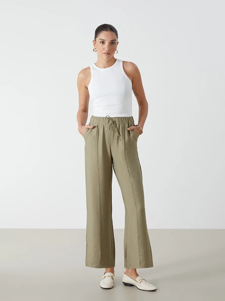 LCWAIKIKI Classic Haki Beli Lastikli Dokulu Geniş Paça Kadın Pantolon ürün görseli 1