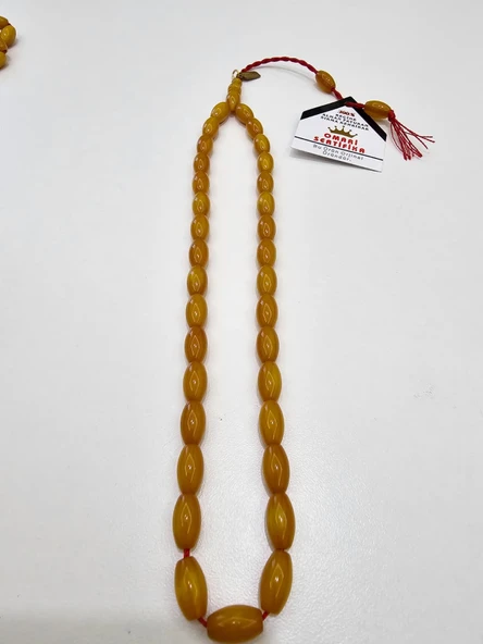 Omari İmzalı Sertifikalı Alman Faturan Sıkma Kehribar Tesbih 7x12 mm Fıçı Kesim ürün görseli 1