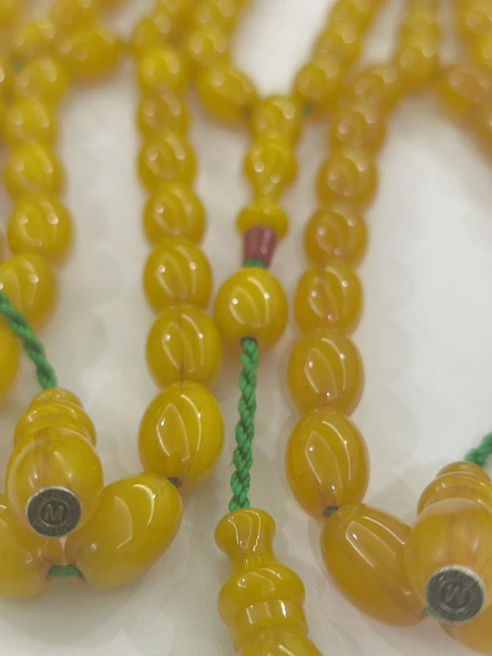 Zeyzun Usta Bilek Boy Efe Maskot Sıkma Kehribar Tespih 15x11 mm Beyzi Kesim ürün görseli 1
